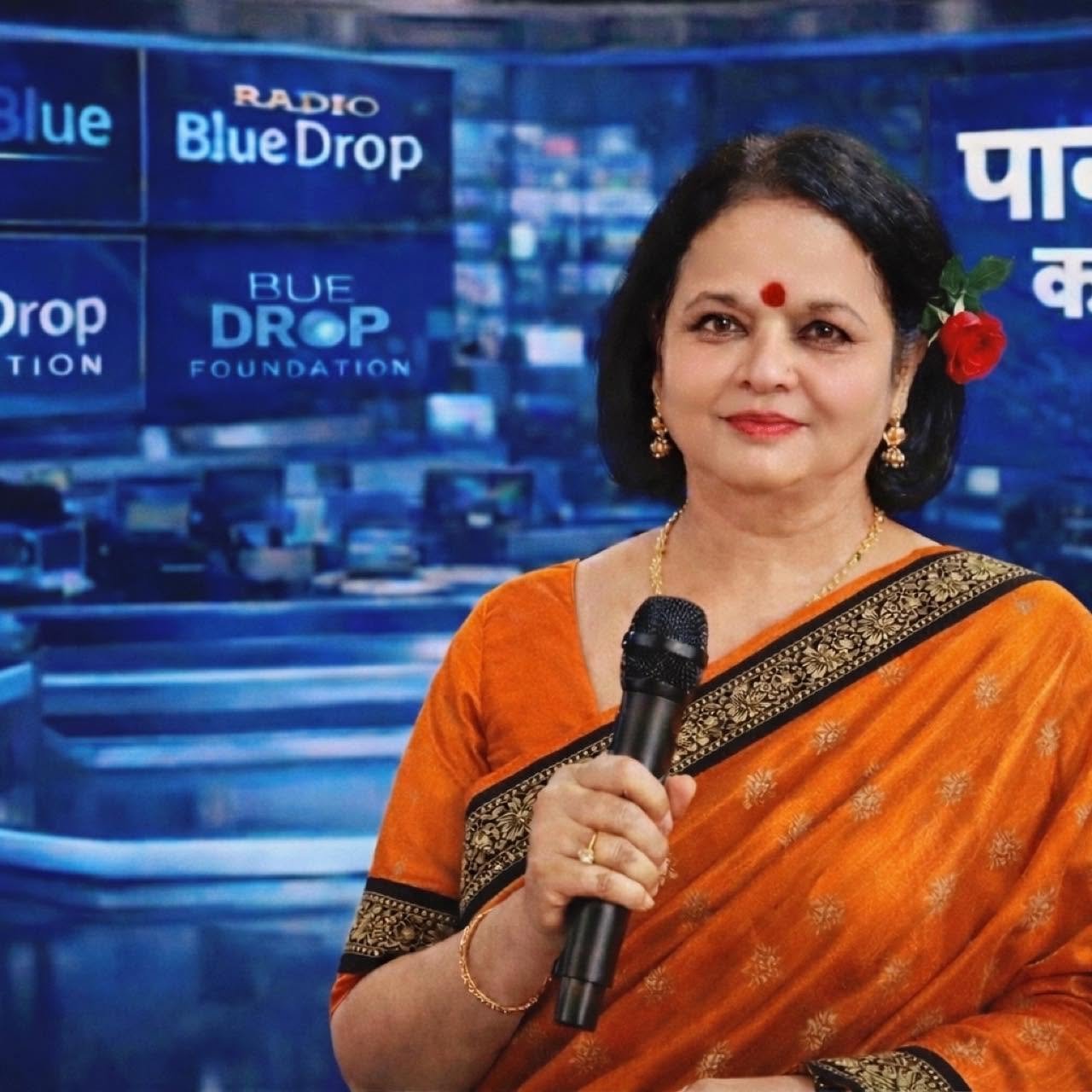 Dr. Meenu Khare speaking with a microphone
